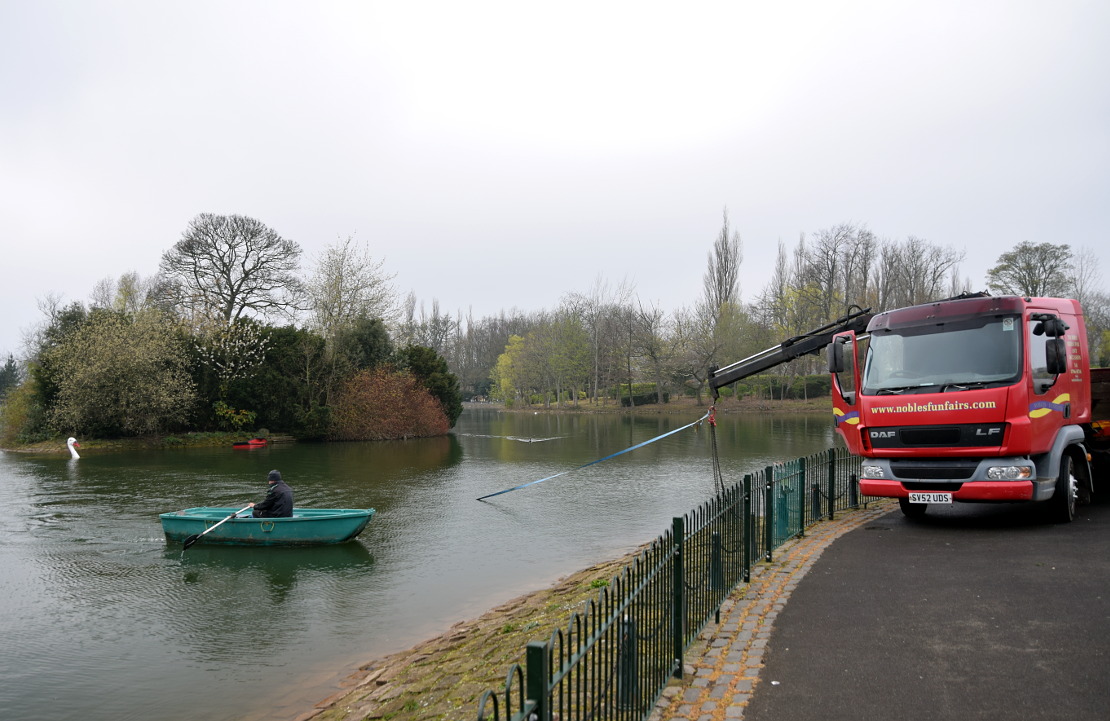 Extracting a sunken pedal boat at Saltwell Park in Gateshead