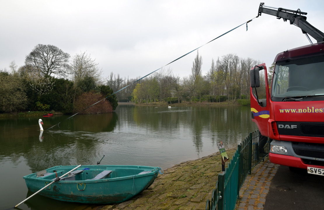 Extracting a sunken pedal boat at Saltwell Park in Gateshead